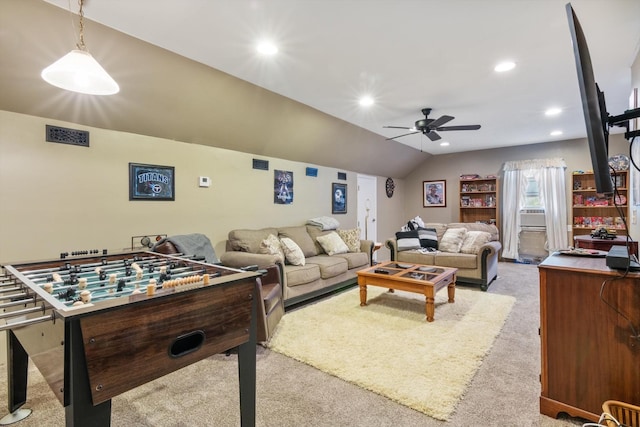 carpeted living room with lofted ceiling and ceiling fan