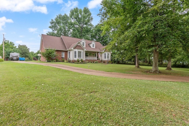 view of front of home with a front lawn