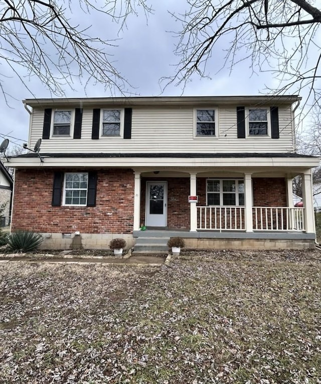 view of front property featuring a porch