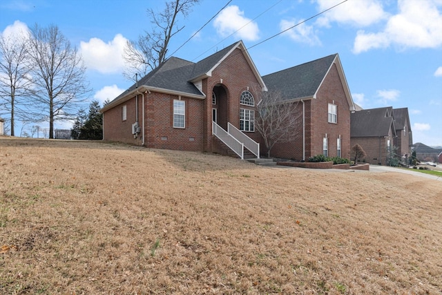 front facade with a front lawn