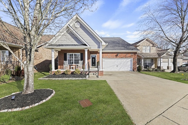 view of front of property featuring covered porch, a front lawn, and a garage