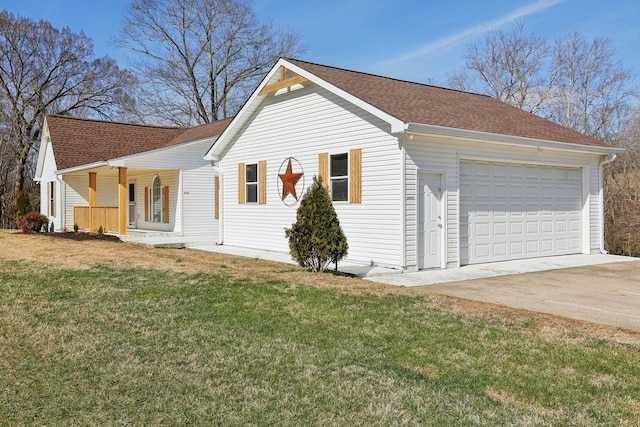 view of front facade featuring a front lawn, a porch, and a garage