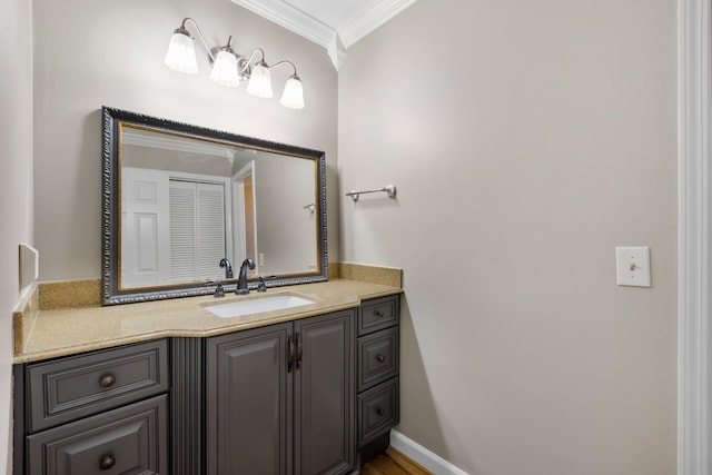 bathroom featuring vanity and crown molding