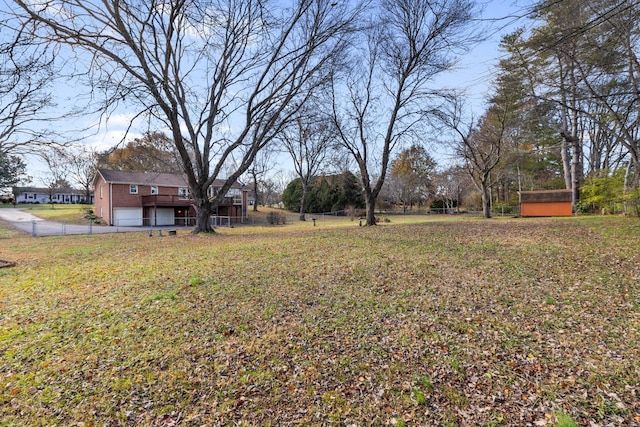 view of yard featuring a garage