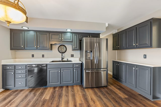 kitchen with sink, gray cabinets, dishwasher, and stainless steel refrigerator with ice dispenser