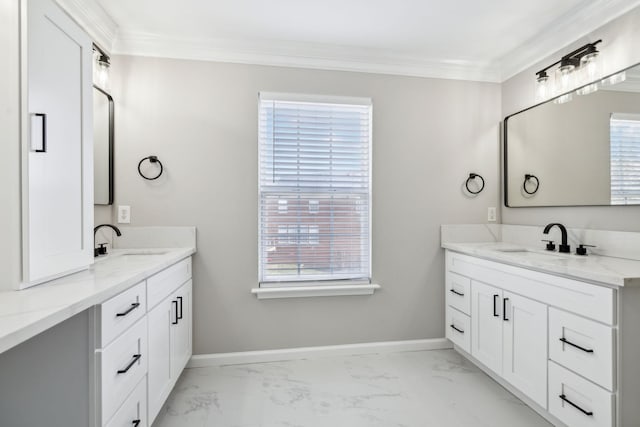 full bathroom featuring baseboards, a sink, and ornamental molding