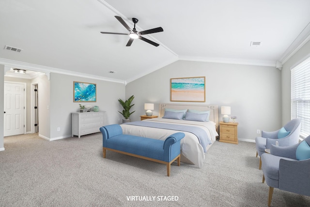 bedroom with light carpet, vaulted ceiling, visible vents, and crown molding