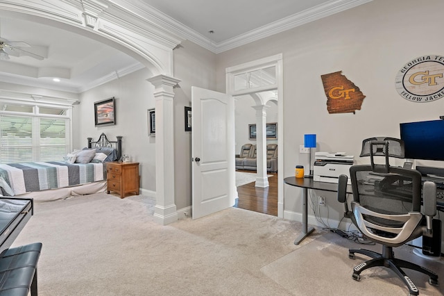 office with ceiling fan, carpet floors, decorative columns, and ornamental molding