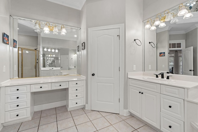 bathroom with tile patterned floors, crown molding, and vanity