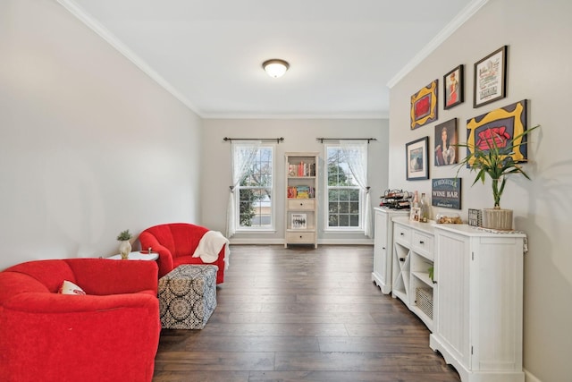 sitting room featuring dark hardwood / wood-style flooring and ornamental molding