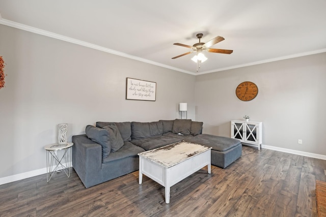 living room with ornamental molding, dark hardwood / wood-style floors, and ceiling fan