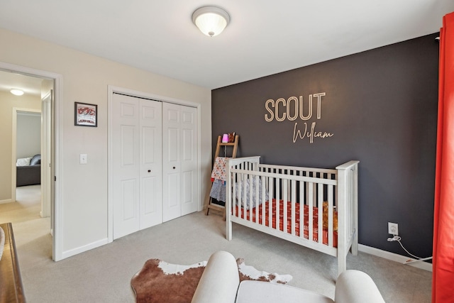 carpeted bedroom with a closet