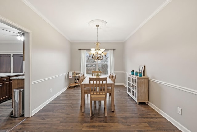 dining space featuring ornamental molding, dark hardwood / wood-style floors, and ceiling fan with notable chandelier