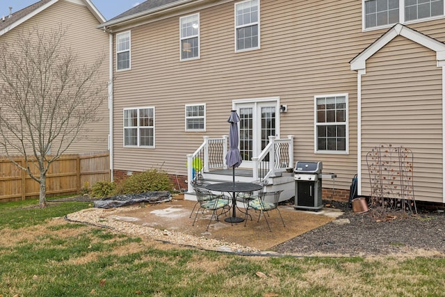 back of house with a patio area