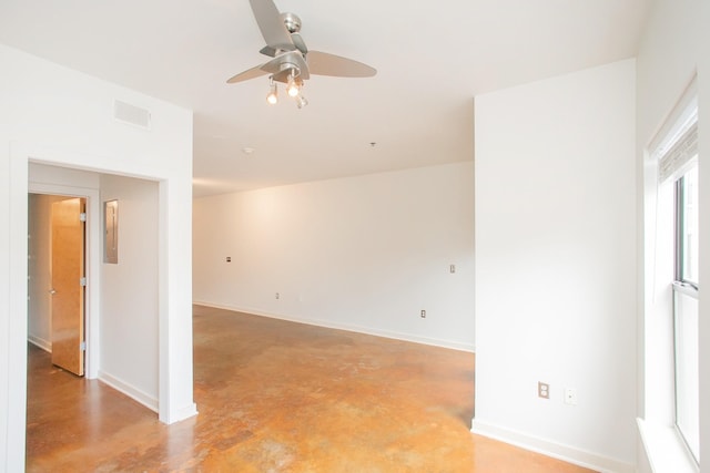 unfurnished room featuring ceiling fan