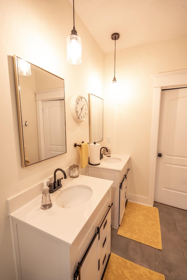 bathroom with tile patterned floors and vanity