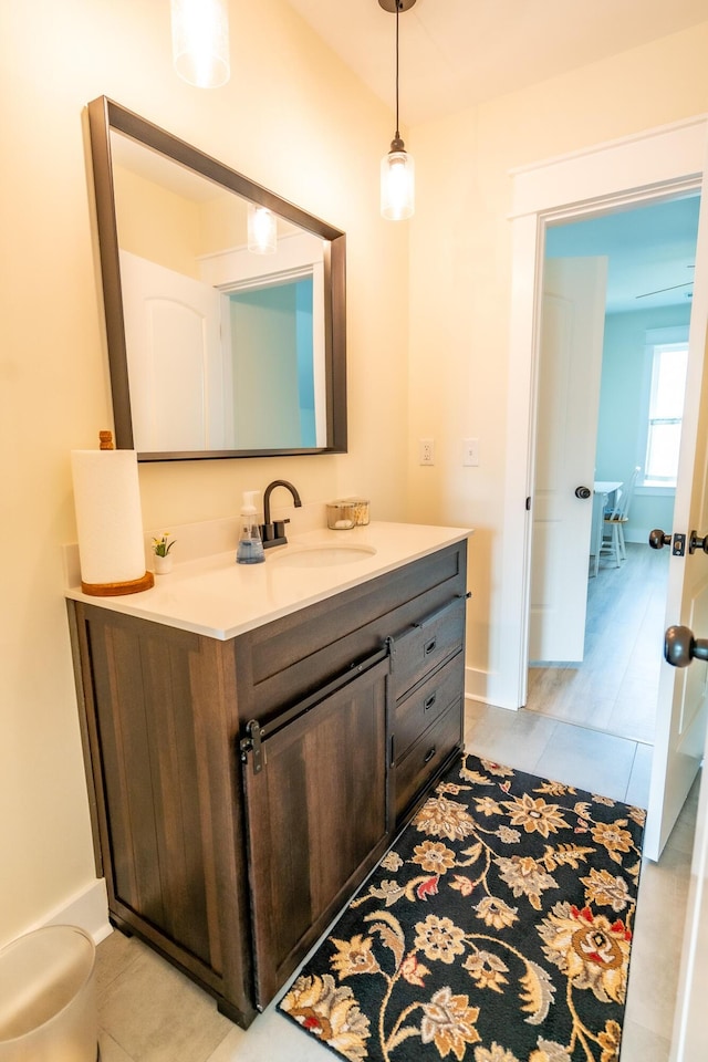 bathroom featuring tile patterned floors and vanity