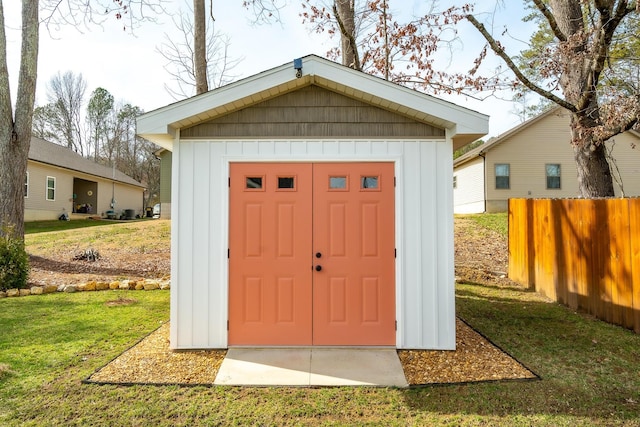 view of outdoor structure with a yard