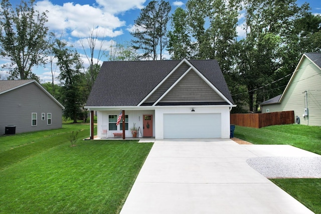 852 Pine Grove Rd, Ringgold, GA 30736 - view of front of house with an attached garage, a porch, driveway, central air condition unit, and roof with shingles