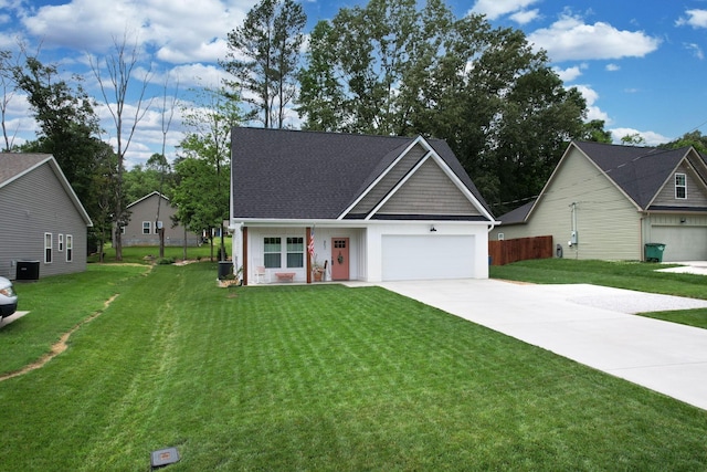 852 Pine Grove Rd, Ringgold, GA 30736 - view of front facade featuring driveway, an attached garage, central AC unit, and roof with shingles
