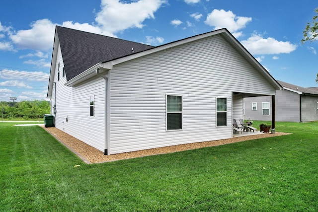 852 Pine Grove Rd, Ringgold, GA 30736 - back of house featuring a patio, a lawn, and a shingled roof