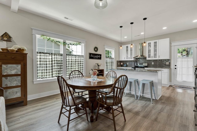 852 Pine Grove Rd, Ringgold, GA 30736 - dining area featuring light wood-style floors, recessed lighting, plenty of natural light, and baseboards