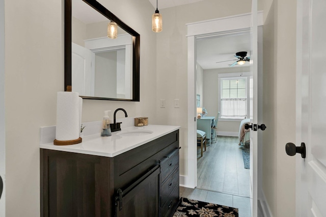852 Pine Grove Rd, Ringgold, GA 30736 - bathroom featuring vanity, ceiling fan, and baseboards
