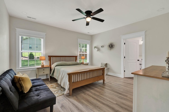 852 Pine Grove Rd, Ringgold, GA 30736 - bedroom with light wood-style floors, baseboards, and a ceiling fan