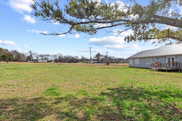 view of yard featuring a deck