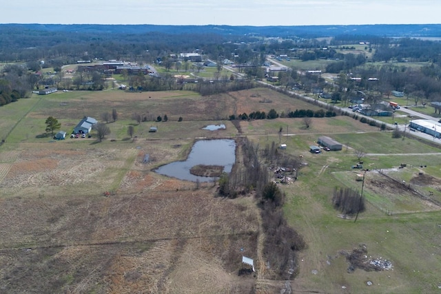 bird's eye view with a water view and a rural view