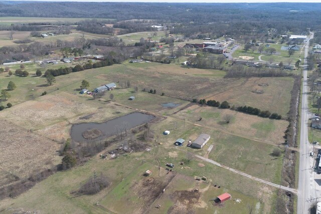 birds eye view of property featuring a rural view