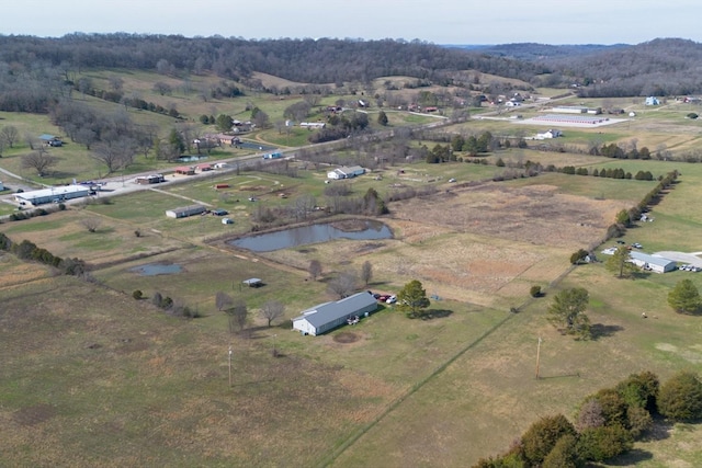 bird's eye view featuring a rural view and a water view