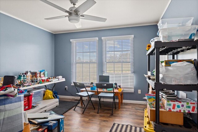 office area with ceiling fan, dark hardwood / wood-style flooring, and crown molding