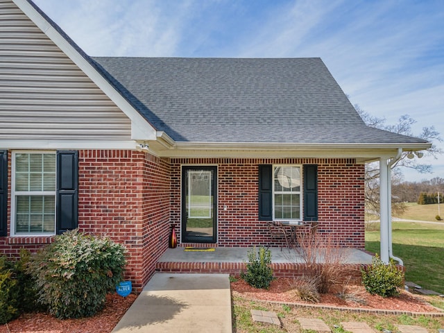 entrance to property with covered porch