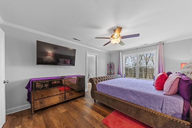 bedroom featuring dark hardwood / wood-style flooring, ornamental molding, and ceiling fan