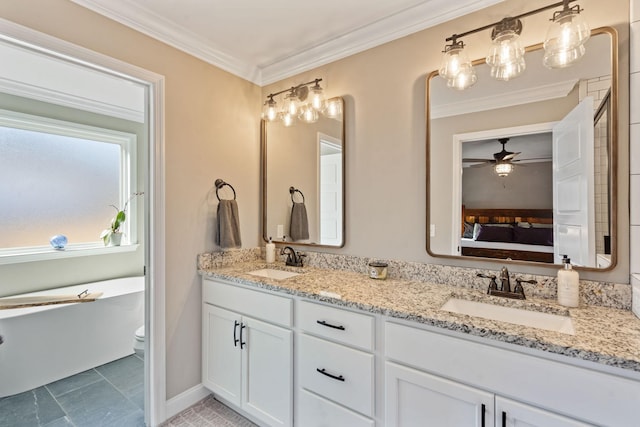 bathroom with ceiling fan, ornamental molding, vanity, and toilet