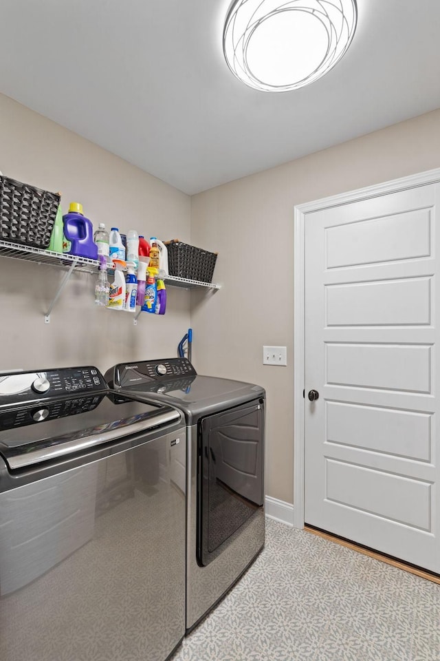 laundry room with washing machine and dryer