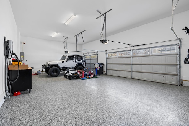 garage featuring a garage door opener