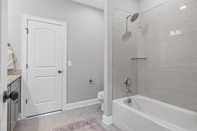 bathroom with vanity, baseboards, toilet, tile patterned floors, and shower / washtub combination