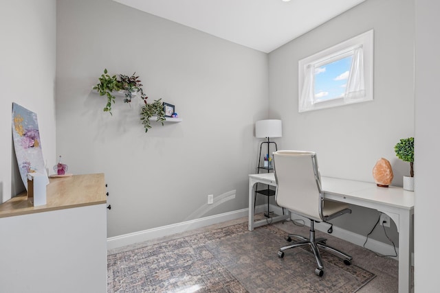 office area featuring baseboards