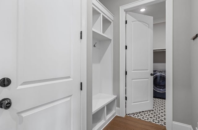 mudroom with washer / dryer and wood finished floors