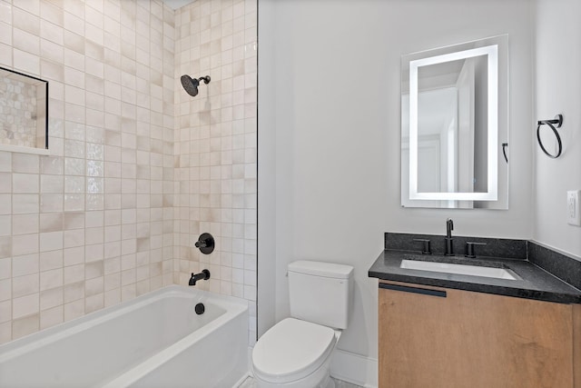 304 35th Ave N, Nashville, TN 37209 - bathroom featuring baseboards, vanity, toilet, and bathing tub / shower combination