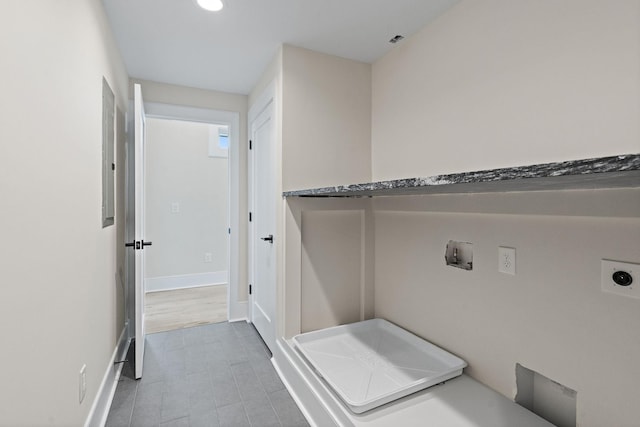304 35th Ave N, Nashville, TN 37209 - laundry room featuring wood finished floors, hookup for a washing machine, baseboards, hookup for an electric dryer, and laundry area