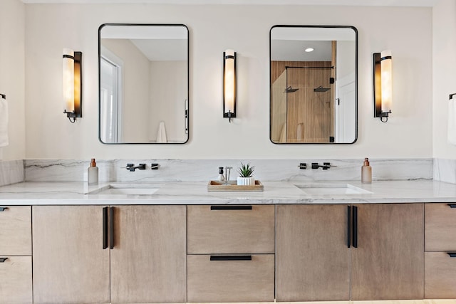 304 35th Ave N, Nashville, TN 37209 - full bathroom with a sink, double vanity, and a stall shower