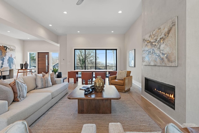 304 35th Ave N, Nashville, TN 37209 - living area featuring plenty of natural light, recessed lighting, light wood-style floors, and a glass covered fireplace