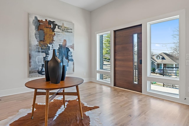 304 35th Ave N, Nashville, TN 37209 - entrance foyer featuring light wood finished floors, baseboards, and visible vents