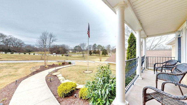 view of patio featuring a porch