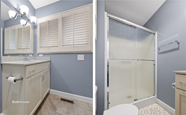 full bathroom featuring a shower stall, visible vents, baseboards, and vanity