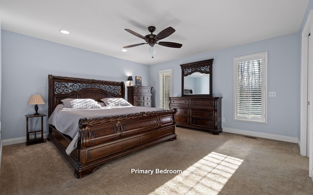 bedroom featuring baseboards, recessed lighting, light carpet, and a ceiling fan