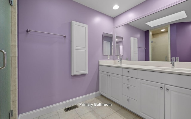 full bathroom featuring a sink, visible vents, baseboards, and tile patterned floors